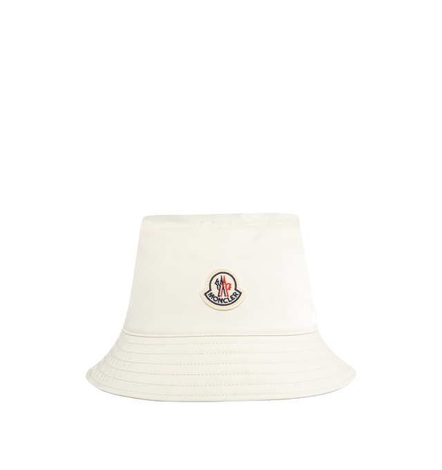 Image 1 of 2 - WHITE - MONCLER Reversible Bucket Hat featuring micro gabardine lining, reversible and logo patch. 100% polyester.
