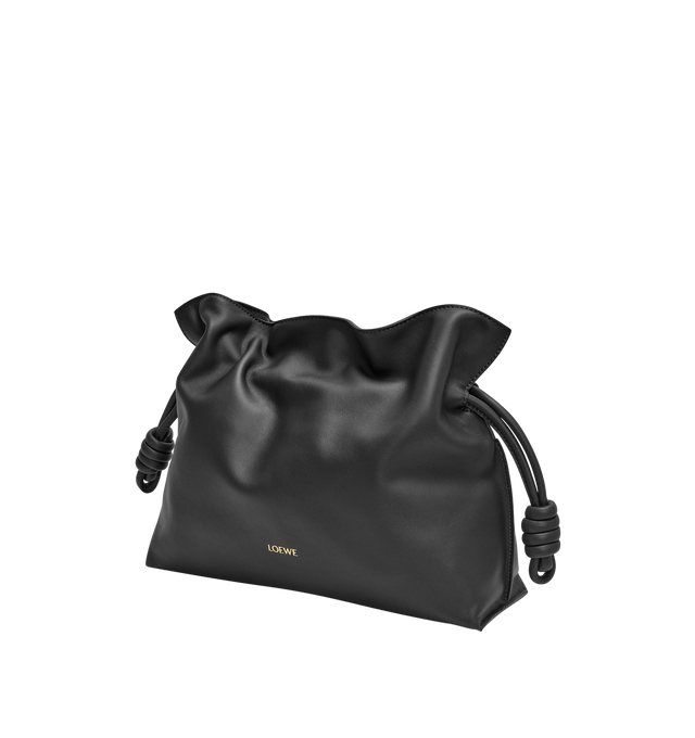 Image 2 of 4 - BLACK - LOEWE Medium Flamenco Clutch in nappa calfskin featuring a soft and slouchy bag with a cinched closure and historical knot drawstrings, shoulder, crossbody or hand carry, detachable and adjustable strap, discreet magnetic closure, suede lining and embossed Anagram. Nappa calf. 24.5 cm x 30 cm x 10.5 cm. Made in Spain.