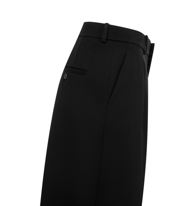 Image 3 of 3 - BLACK - SAINT LAURENT Bermuda Classique Shorts featuring high-waisted, wide leg, center crease, double pleat, concealed front button and hook closure, zip fly, two slash pockets at the front, two welt pockets with button at the back and waistband with belt loops. 100% wool. Made in Italy.