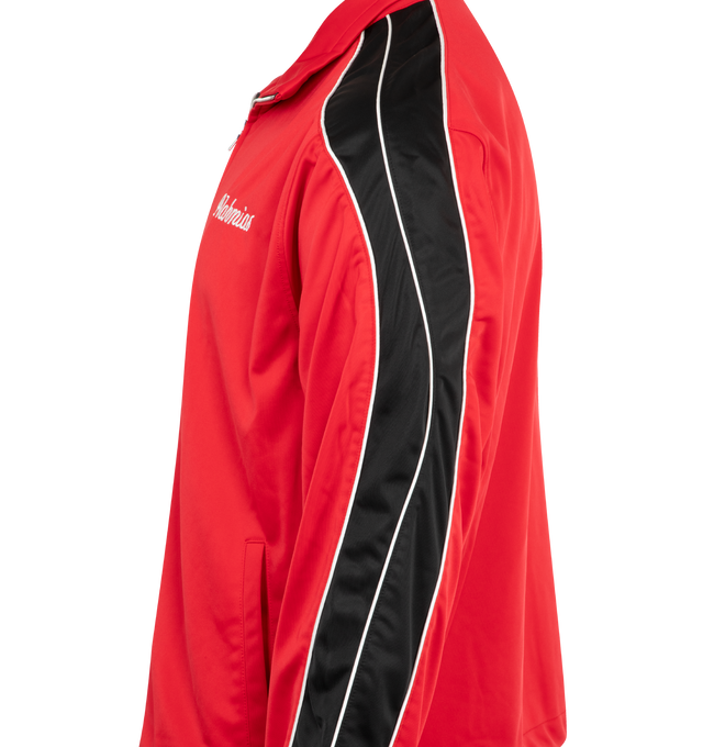 Image 3 of 3 - RED - NAHMIAS Zip Up Track Jacket featuring zip up front closure, side pockets, logo on chest and stripe down sleeves. 100% nylon.