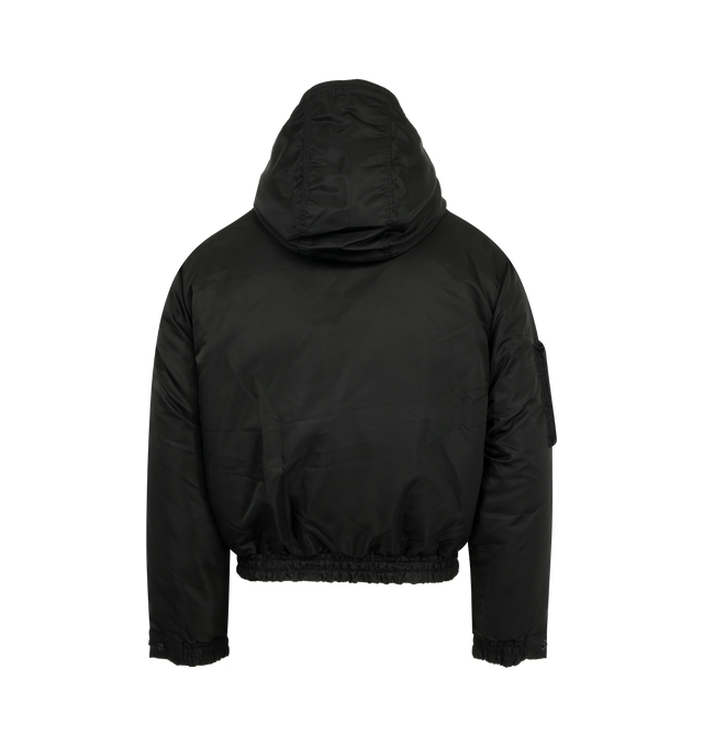 Image 2 of 3 - GREEN - Canada Goose Men's Windrow Bomber is crafted from durable recycled poly twill and features an intentionally oversized, hip-length silhouette designed for flexible all-season wear. Filled with 750 fill power responsibly sourced down, this bomber is equipped with an adjustable hood, concealed snap placket over a front zip closure, rib-knit cuffs and hem, and adjustable snap cuffs to help retain warmth. Functional details include a bicep pocket on the right sleeve, two exterior welt pock