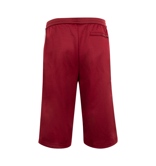 Image 2 of 3 - RED - Adidas x Wales Bonner Track Shorts featuring loose fit, drawcord on elastic waist and side zip pockets. 61% polyester, 39% cotton.