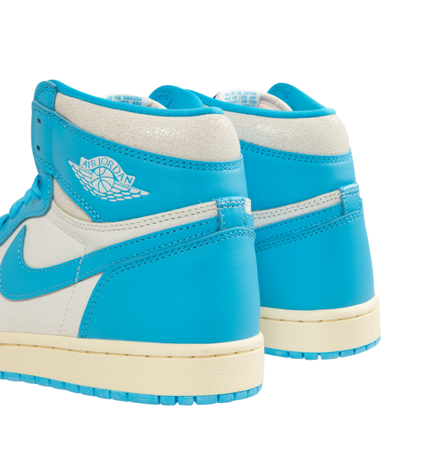 Image 3 of 5 - BLUE - JORDAN Air Jordan 1 Retro High OG Sneaker featuring high-top silhouette, genuine leather upper, classic Wings logo stamped on collar and a stitched-down Swoosh logo for heritage style, encapsulated Air-Sole units and rubber outsole.