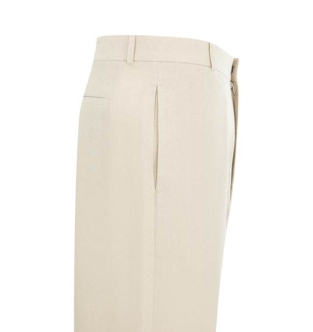 Image 3 of 3 - NEUTRAL - THE ROW Toril Pant featuring mid-rise pants in lightweight suiting with a wide straight leg, pressed front and back creases and side seam pockets. 55% linen, 45% viscose. Made in Italy.