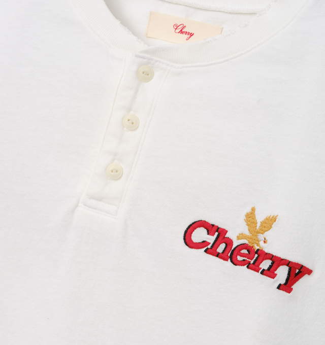 Image 3 of 6 - WHITE - Cherry LA Men's Henley T-Shirt is crafted from cotton and features a boxy-fit silhouette with a classic Henley neckline. Designed with embroidered detailing at the front, this elevated everyday essential combines relaxed proportions with signature Cherry LA styling. Main Material: Cotton. Made in Los Angeles, California.
