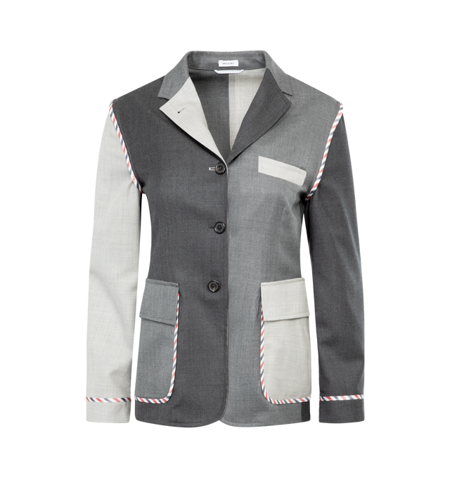 Image 1 of 3 - GREY - THOM BROWNE Sport coat crafted from wool twill fabric in an unconstructed silhouette adorned with tri-color trim and charcoal colorblocking.  Featuring front button closure, notched lapels, chest welt pocket; front flap-patch pockets, and back vent. 100% wool.  Made in Italy. 