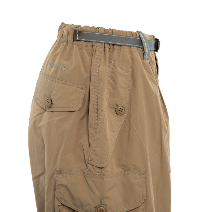 Image 3 of 3 - BROWN - AND WANDER Oversized cargo pants in a water-repellent ripstop fabric with a unique elasticity and color due to the use of split yarn. Cargo pants with a loose and wide silhouette. POLYESTER 67% NYLON 33%. 