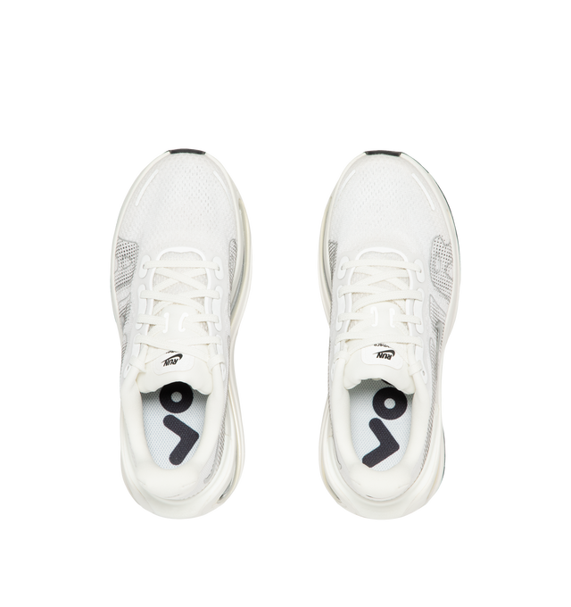 Image 5 of 5 - WHITE - Nike Women's Vomero Premium Running Shoes feature an engineered mesh upper for lightweight breathability and a secure fit. Designed for maximum cushioning, these performance running shoes combine a full-length ZoomX foam midsole with dual Air Zoom units at the forefoot and heel for exceptional comfort, responsive energy return, and a smooth ride. A durable Waffle rubber outsole provides reliable traction for everyday miles. Main Material: Mesh. Midsole: ZoomX Foam with Dual Air Zoom U