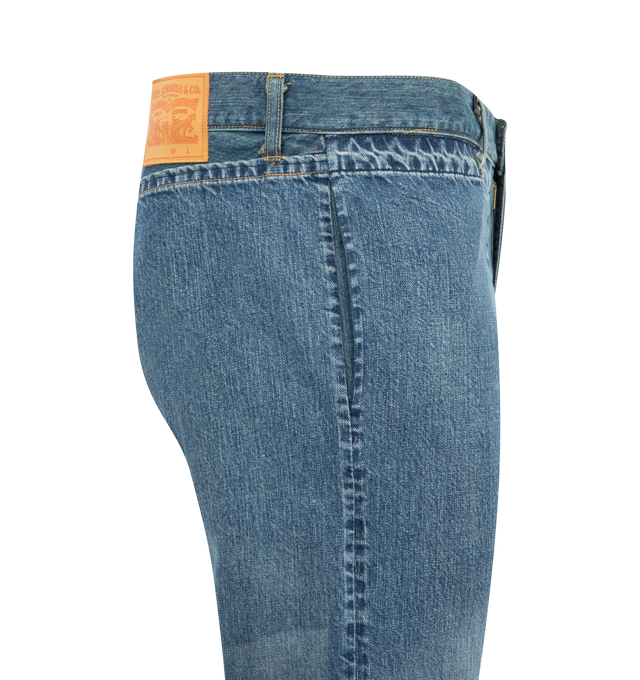 Image 3 of 3 - BLUE - JUNYA WATANABE Deconstructed Wide Leg Jeans featuring a deconstructed design with an asymmetric double waistband, unconventional hem includes repurposed pockets and a side split, mid rise, full length, wide legs, button and zip fly and belt loops. 100% cotton. Made in Japan.