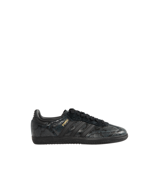 Image 1 of 5 - BLACK - Adidas Men's Samba OG Snake-Effect Sneakers are crafted from calf leather. Features a snake-effect finish, round toe, lace-up closure, signature 3-Stripes, logo-print tongue, branded heel counter, and flat rubber sole. Upper: Calf Leather; Lining: Calf Leather; Sole: Rubber. Made in Cambodia.