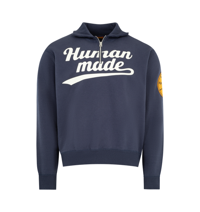 Image 1 of 3 - BLUE - HUMAN MADE Half Zip Logo Sweatshirt featuring soft fleece fabric, classic collar, half zip closure, sleeve patch detail and patch & printed branding. 100% cotton.