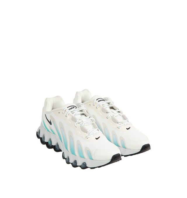 Image 2 of 5 - WHITE - NIKE Air Max Dn8 Sneaker featuring Dynamic Air system with dual-chambered tubes with tuned pressure levels, full-length Dynamic Air system sits directly on top of the rubber outsole, plush foam, sculpted upper is made from lightweight mesh on top and plastic heel clip.