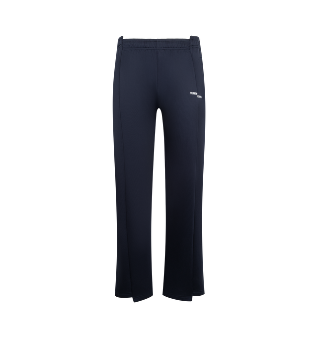 Image 1 of 3 - NAVY - VETEMENTS Cut-Up Athletic Sweatpants featuring paneled construction, concealed drawstring at elasticized waistband, two-pocket styling, logo embroidered at front and asymmetric cuffs. 56% polyamide, 44% cotton. Made in Portugal.