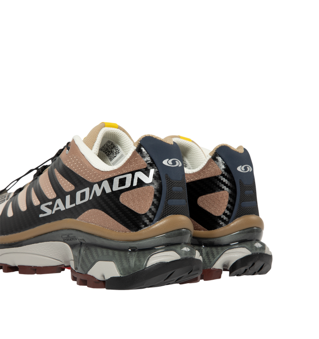 Image 3 of 5 - BROWN - Salomon Men's XT-4 OG Sneakers are crafted with a lightweight textile and synthetic upper and feature the brand's Agile Chassis System, Quicklace technology, and dual-density EVA cushioning for exceptional stability and comfort. Reviving one of Salomon's iconic trail-running silhouettes, these designer sneakers combine technical performance with archival outdoor style, delivering superior support, durability, and all-terrain traction for both city streets and rugged trails. Main Mater