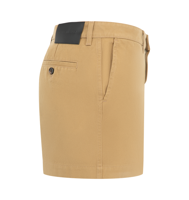 Image 3 of 3 - NEUTRAL - Balenciaga Womens Mini Cotton Skirt is crafted from heavy cotton. Feature a mid-rise waist, covered zip fly, belt loops, front slash pockets, back buttoned welt pocket, and a Balenciaga logo leather patch at the back. Main Material: 100% Cotton; Pocket Lining: 100% Cotton; Trim: Cow Leather. Made in Italy.