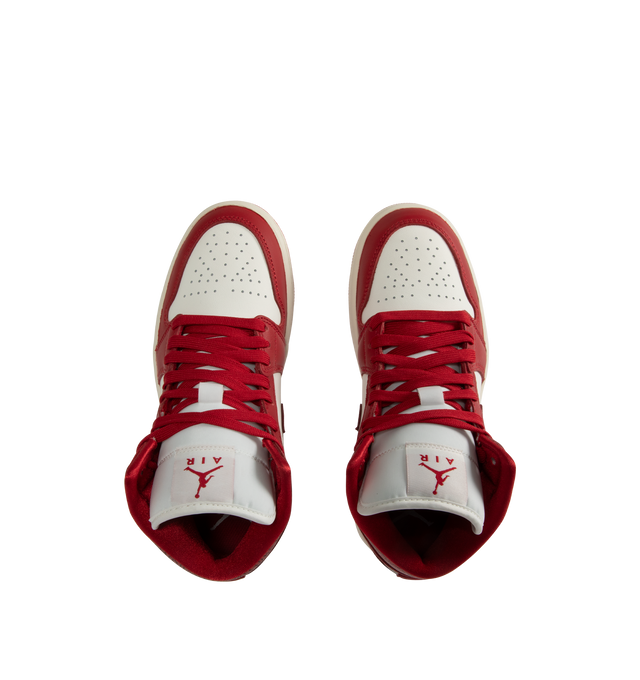 Image 5 of 5 - RED - JORDAN Air Jordan 1 Mid SE Sneaker featuring genuine leather in the upper, Nike Air technology, soft foam in the midsole, rubber in the outsole, wings logo on collar and Jumpman on tongue.