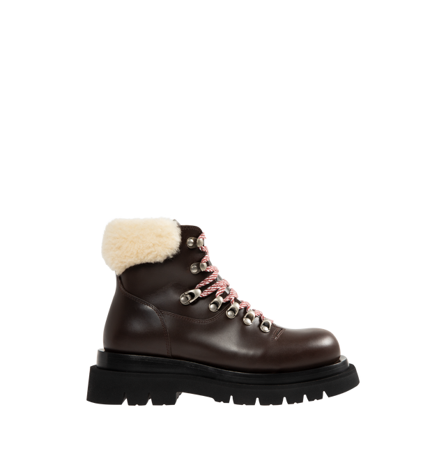 Image 1 of 4 - BROWN - BOTTEGA VENETA Lug Hiking Ankle Boot featuring lace-up hiking ankle boot crafted from calfskin leather, a merino shearling collar and micro rubber outsole. Calfskin, lambskin. Made in Italy.