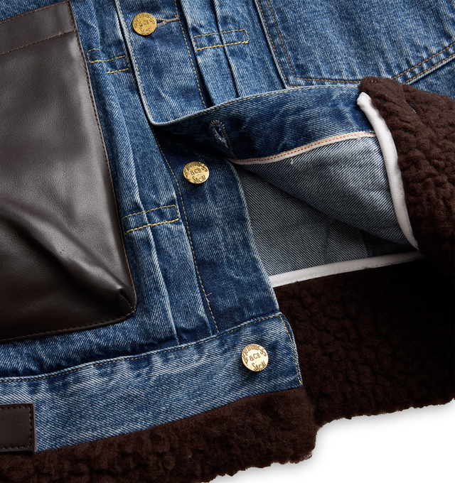 Image 4 of 5 - BLUE - Sacai X Levi's Men's Denim Jacket are crafted from a medium-dark wash cotton denim paired with contrasting plush faux-shearling/sherpa accents at the collar, cuffs, and hem. Main Material: 100% Cotton. Made in Japan.