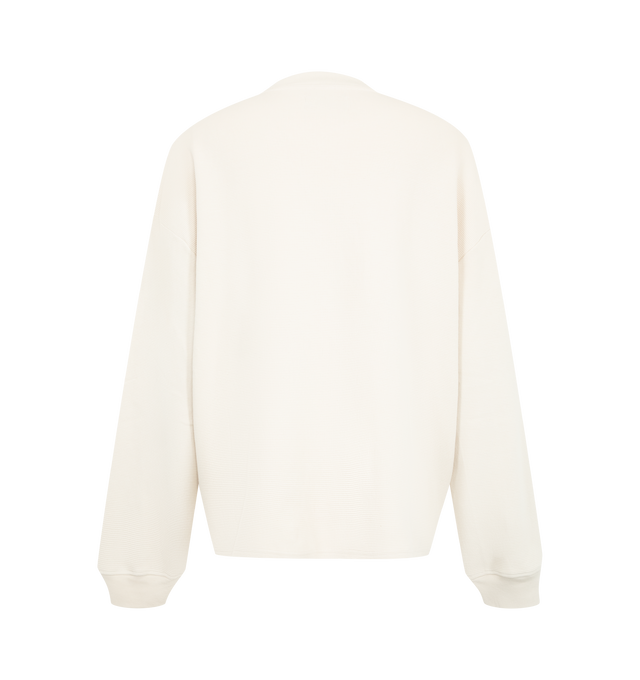 Image 2 of 2 - CREAM - Nahmias Men's Kick Rocks Varsity Long Sleeve Tee is crafted from cotton and features a loose-fit silhouette, hand-beaded detailing, and long sleeves. Designed in Los Angeles and hand-finished in India, this elevated graphic style combines artisanal embellishment with everyday comfort. Main Material: 100% Cotton. Designed in Los Angeles. Hand-Beaded in India.