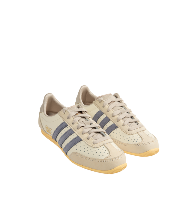Image 2 of 5 - MULTI - Adidas Japan W Sneakers are a low top, lace-up style with leather uppers, perforations for breathability, double stitching at the toes and heel counters for durability and support, textured EVA midsoles, and signature gold branding.