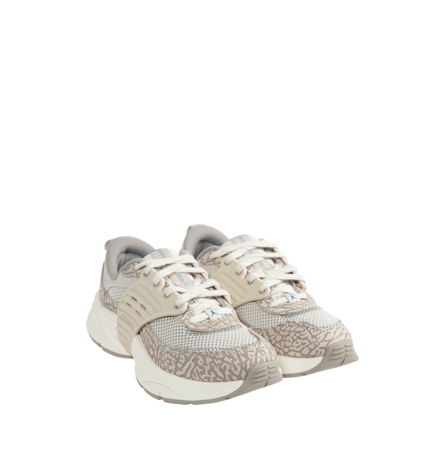 Image 2 of 5 - GREY - Women's Jordan Trunner O/S Sneakers feature a breathable mesh upper with suede overlays and a modern silhouette inspired by the original Jordan Trunner. These lifestyle sneakers combine responsive foam cushioning, molded midfoot support wings, and a durable rubber outsole for lightweight comfort, stability, and everyday traction. Main Material: Mesh and Suede. Midsole: Responsive Foam. Sole: Rubber.