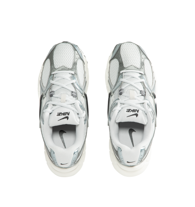 Image 5 of 5 - GREY - Nike Men's V5 RNR Sneakers feature a layered suede and mesh upper for a breathable, Y2K-inspired look with retro running style. These lifestyle sneakers combine a lightweight foam midsole, plush collar lining, and a durable rubber outsole with 2000s-inspired grooves for all-day comfort and reliable traction. Main Material: Suede and Mesh. Midsole: Foam. Sole: Rubber.