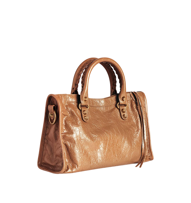 Image 2 of 4 - BROWN - BALENCIAGA Le City Bag Small featuring arena lambskin, two leather hand-braided handles, removable and adjustable shoulder strap, brass hardware, zipped closure with knotted leather puller, front zipped pocket with knotted leather puller, 1 inner zipped pocket and cotton canvas lining. Lambskin. 11.8" x 7.5" x 3.8". Made in Italy.