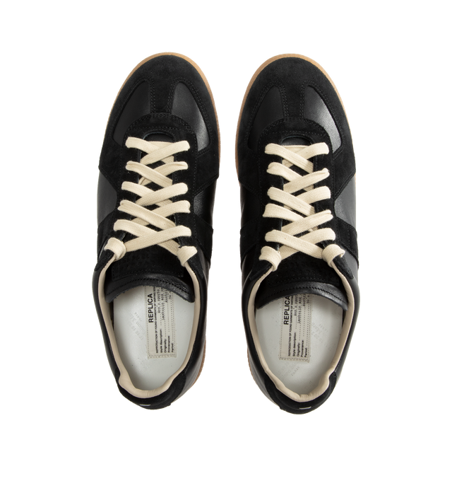 Image 5 of 5 - BLACK - Maison Margiela Replica Sneakers featuring lace-up sneakers in nappa leather and crust leather, contrasting sole, Maison Margiela logo label on the tab, internal Replica label, internal elastic and all-over Maison Margiela logo insole. 100% calf leather. Sole: 100% rubber. Made in Italy.