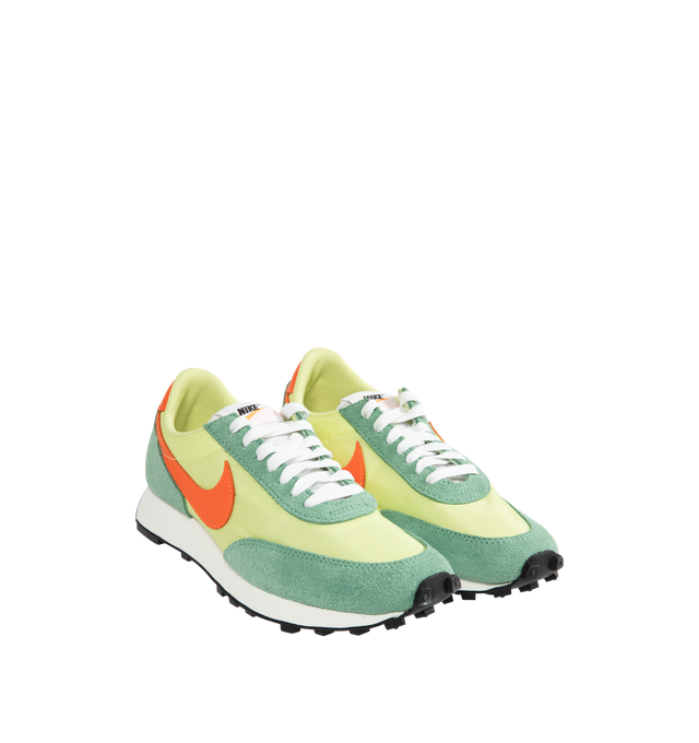 Image 2 of 5 - GREEN - Nike Men's Daybreak running shoe, inspired by colors from the '70s running boom era, combining breathable mesh and shaggy suede with a vintage Waffle outsole. Electro Orange accents radiate against the smooth Limelight and Healing Jade colorway. Calf Suede and fabric with rubber sole.