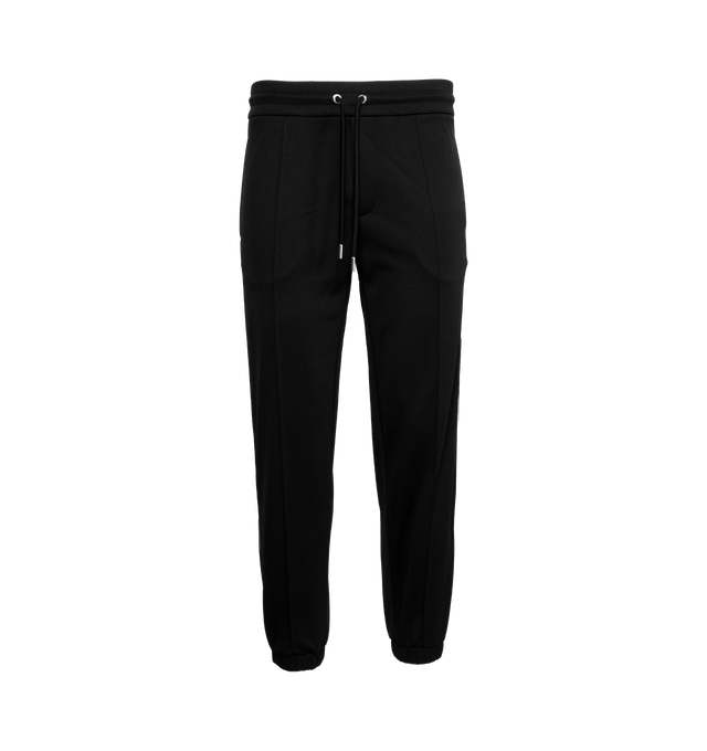 Image 1 of 3 - BLACK - MONCLER Triacetate Sweatpants featuring waistband with drawstring fastening, welt pocket on the back and side bicolor piping. 100% polyester. Made in Albania. 