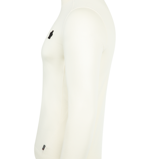 Image 3 of 4 - WHITE - MONCLER GRENOBLE Polartec Turtleneck featuring Polartec Power Grid Rec Base Layer, turtleneck, wrist gaiters, logo details and silicone logo patch. 88% polyester, 12% elastane/spandex. Made in Portugal.