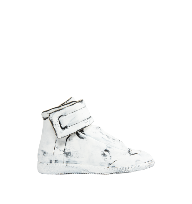Image 1 of 5 - WHITE - MAISON MARGIELA Future Sneaker Bianchetto featuring calfskin, upper and sole are finished with our Bianchetto technique, white paint brushed across the surface to reveal the black leather beneath at the edges, hidden strap folds across the tongue and signature white stitch at the back.