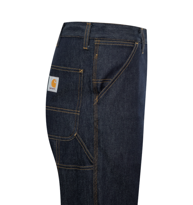 Image 3 of 3 - BLUE - CARHARTT WIP Single Knee Jeans featuring relaxed-fit, straight-leg, belt loops, five-pocket styling, zip-fly, utility pocket at outseams, logo patch at back pocket and contrast stitching in tan. 100% cotton.