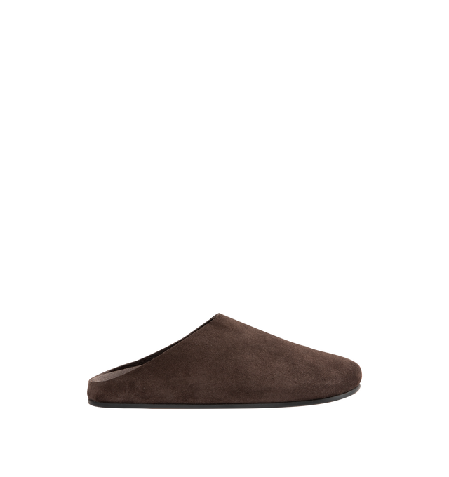 Image 1 of 4 - BROWN - THE ROW Hudson Slide in Suede featuring relaxed slip-on shoe in natural suede with round toe, contoured footbed, and rubber sole. 100% calfskin leather. Rubber sole. Made in Italy.