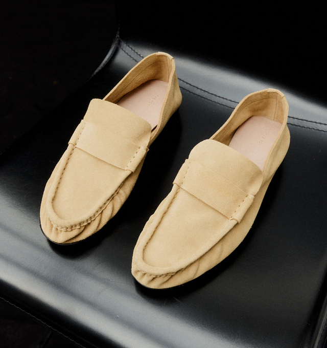 Image 2 of 5 - NEUTRAL - The Row Lightweight moccasin in soft calfskin suede with oval toe, stitched vamp strap, and stacked 0.39" heel. 100% Calfskin Suede with leather sole. Made in Italy.