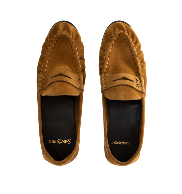 Image 4 of 4 - BROWN - SAINT LAURENT Le Loafer 15 Moc featuring supple penny loafers decorated with the cassandre, a hand-stitched moc toe and leather sole. Calfskin. Made in Italy.