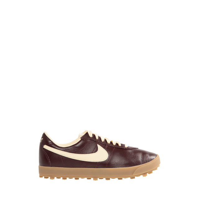 Image 1 of 5 - BROWN - NIKE Astrograbber Leather Sneaker featuring leather upper that softens and gains vintage character with wear, rubber waffle outsole, low-cut silhouette, padded collar and foam midsole.