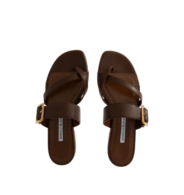 Image 4 of 4 - BROWN - Manolo Blahnik Thalusa nappa leather flat sandals featuring an open toe, crossover front straps with toe stem, instep strap with gold buckle design detail and flat stacked 10mm heel. Upper: 100% lamb nappa. Sole: 100% calf leather. Lining: 100% kid leather. Made in Italy.
