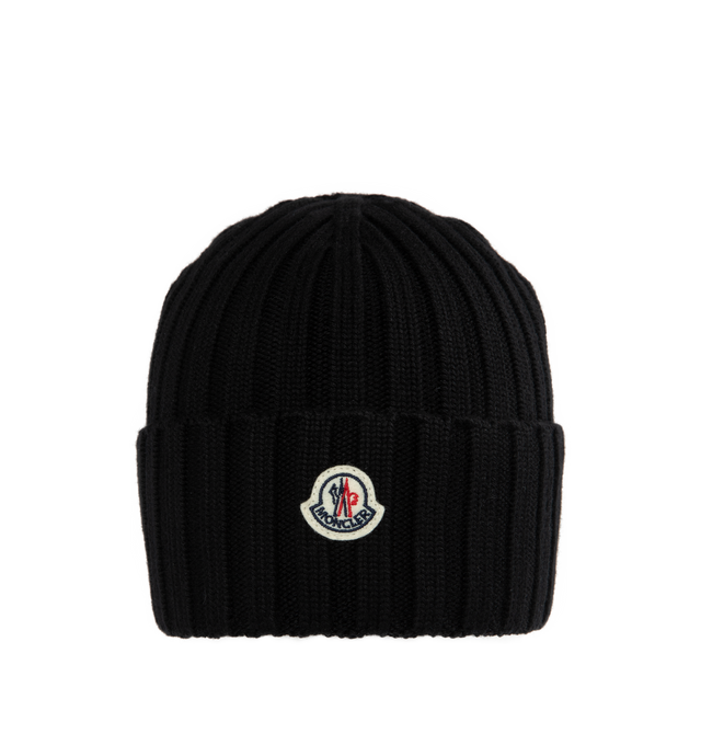 Image 1 of 2 - BLACK - MONCLER Wool Beanie featuring ribbed knit, Gauge 5 and logo patch. 100% virgin wool. 