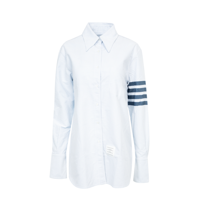 Image 1 of 3 - BLUE - Thom Browne essential cotton shirt with meticulous tailoring. Features front button closure, 4-Bar detail at one sleeve, patch chest pocket, name tag applique above hem at the front, seamed back yoke with locker loop and signature striped grosgrain loop tab. 100% Cotton. 