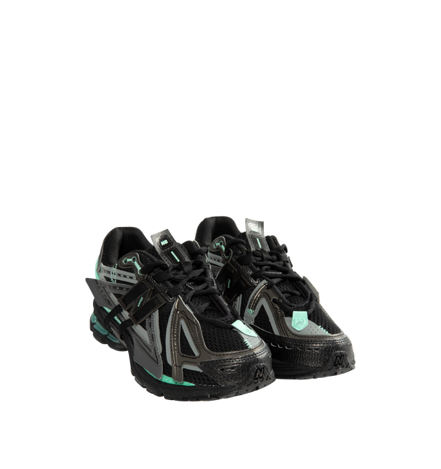 Image 2 of 5 - BLACK - New Balance Unisex 1906A "Tech Explosion / Black Bright Mint" Sneakers feature a performance-inspired silhouette rooted in early-2000s running design and equipped with advanced cushioning technologies for all-day comfort. Built with a breathable mesh upper, mesh underlays, and curvilinear synthetic overlays, this updated style combines technical heritage with a modern aesthetic. The sole unit pairs ACTEVA LITE cushioning, ABZORB SBS heel pods, and an N-ergy outsole for responsive co