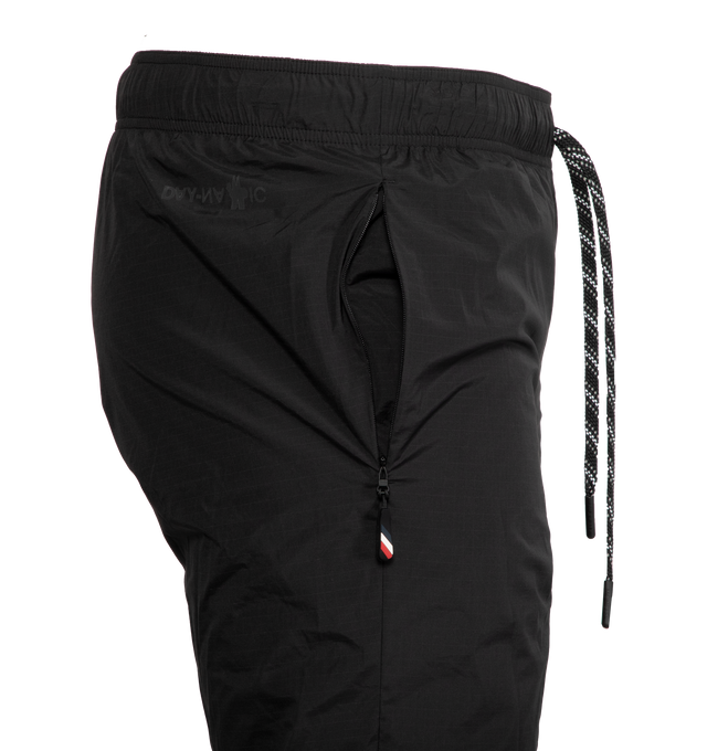 Image 3 of 4 - BLACK - MONCLER GRENOBLE Ripstop Trousers featuring technical mesh lining, internal elastic waistband with reflective drawstring fastening, zipped side pockets and logo and reflective details. 87% polyamide/nylon, 13% elastane/spandex. Lining: 100% polyester. 