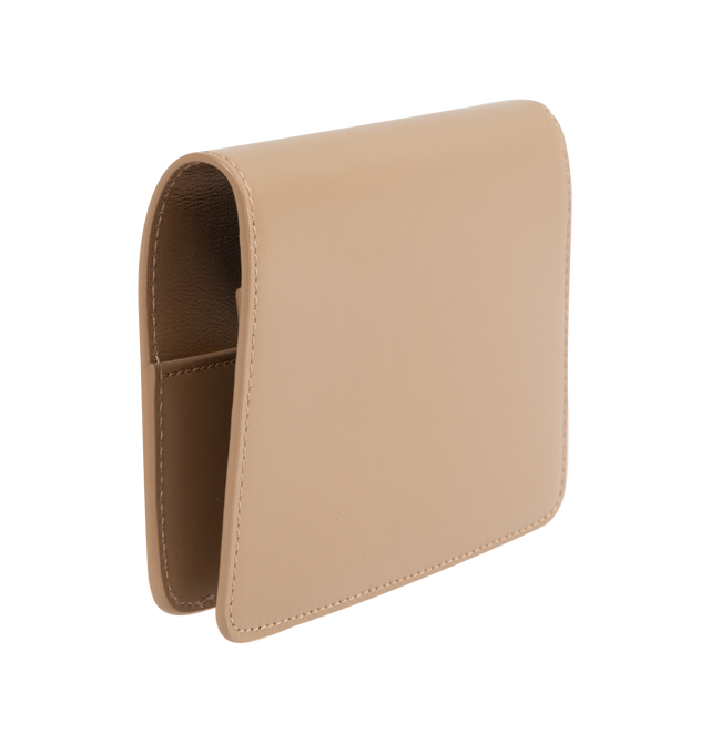 Image 2 of 3 - BROWN - Saint Laurent VOLTAIRE passport holder with inner card slots, decorated with the CASSANDRE. Featuring leather lining, bronze-toned hardware, two flat pockets, five card slots. Measures 5.3" x 3.9" x 0.8". Made in Italy.