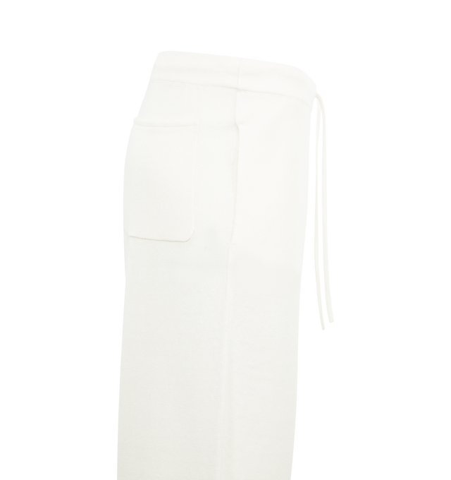 Image 3 of 3 - WHITE - THE ROW Jory Pants featuring relaxed pant in textured linen knit with wide leg, back patch pocket, and drawstring waistband. 58% linen, 25% viscose, 17% cotton. Made in Italy.