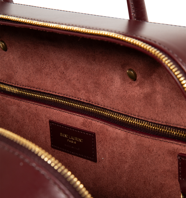 Image 3 of 3 - RED - SAINT LAURENT Sac De Jour Bauletto Bag crafted in smooth leather featuring a wide double-zip opening, long handles, leather lining, bronze-tone hardware, zip closure, one zip pocket and one flat pocket. 13" x 9.3" x 3.9". Calfskin. Made in Italy.
