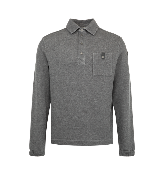 Image 1 of 3 - GREY - Moncler Men's Cotton Long Sleeve Polo Shirt is crafted from a cotton blend and features a relaxed silhouette with a polo collar and snap-button closure. Designed in a loose fit, this long-sleeve style is detailed with a chest pocket accented by a leather button tab, elastic cuffs, and a leather logo patch. Main Material: Cotton Blend 66% Cotton, 34% Polyamide / Nylon.