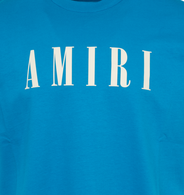 Image 2 of 2 - BLUE - AMIRI Core Logo Tee featuring short sleeves, crew neck, relaxed fit and logo across the chest. 100% cotton.  