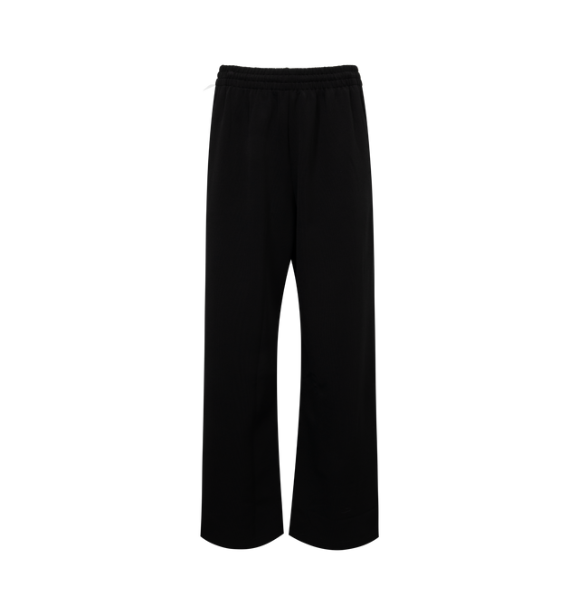 Image 1 of 3 - BLACK - WARDROBE.NYC Semi Matte Track Pants featuring elasticated waistband, consealed drawstring, slip pockets and wide legs. 60% viscose, 30% polyamide, 10% elastane. 