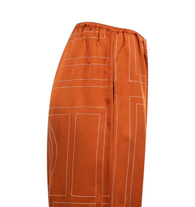 Image 3 of 3 - ORANGE - TOTEME Monogram Silk PJ Bottoms featuring mid-weight, fluid silk twill, embroidered with a fine monogram pattern, relaxed, straight-leg silhouette, elasticated waistband and side pockets. 100% silk.