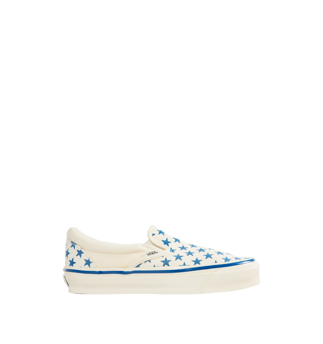 Image 1 of 5 - BLUE - VANS LX Classic Slip On 98 Sneaker featuring padded collar, elastic side panels for easy slip-on and off, higher sidewall with greased finish, foxing tape, Sola Foam ADC insole, signature waffle outsole pattern and vulcanized build.